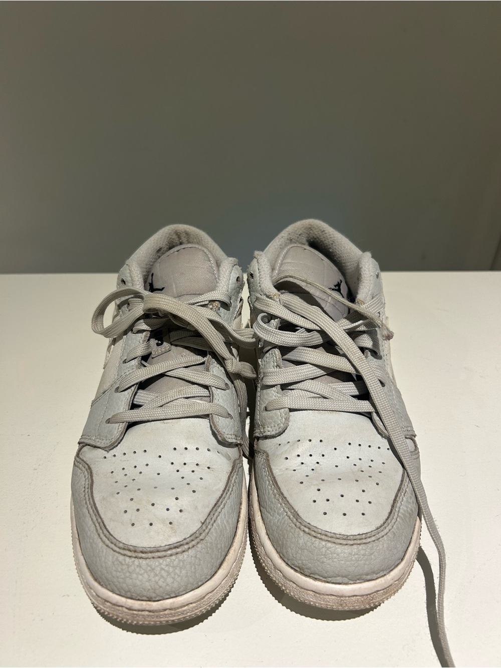 Nike gray and white shoe interior label